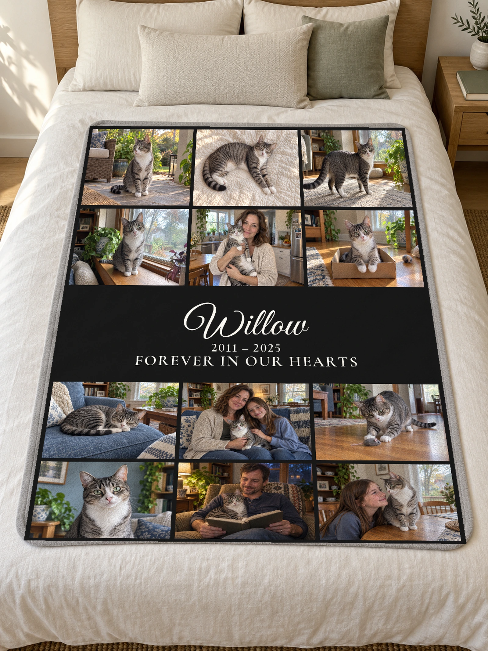 Willow’s black memorial collage blanket on a bed, with photographs of the silver-and-white tabby around a large centered script name.