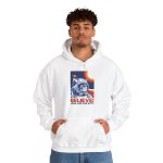 Person wearing a hoodie showing a gray tabby astronaut, a ringed golden planet and stars on deep blue
