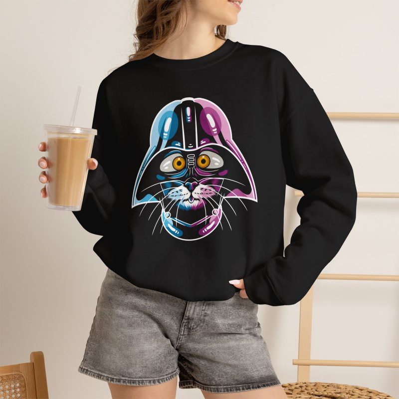 Person wearing a crewneck sweatshirt showing an amber-eyed cat in a dark sci-fi helmet with cyan, magenta and white highlights