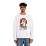 Person wearing a crewneck sweatshirt showing a giant brown tabby holding a blue fish above waves in front of a red sun disc