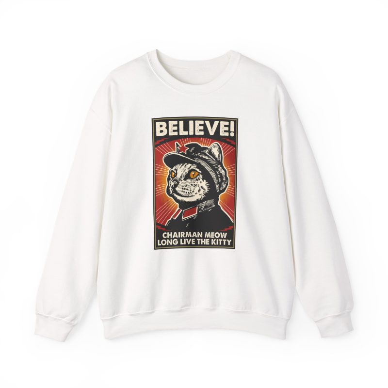 Front of the crewneck sweatshirt showing a stern black-and-cream cat in a red-star cap with orange-red sunburst rays and a black frame