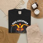 A dark gray horned cat with yellow eyes, a skull, a pentagram and a flame inside a white dotted circle in the front print