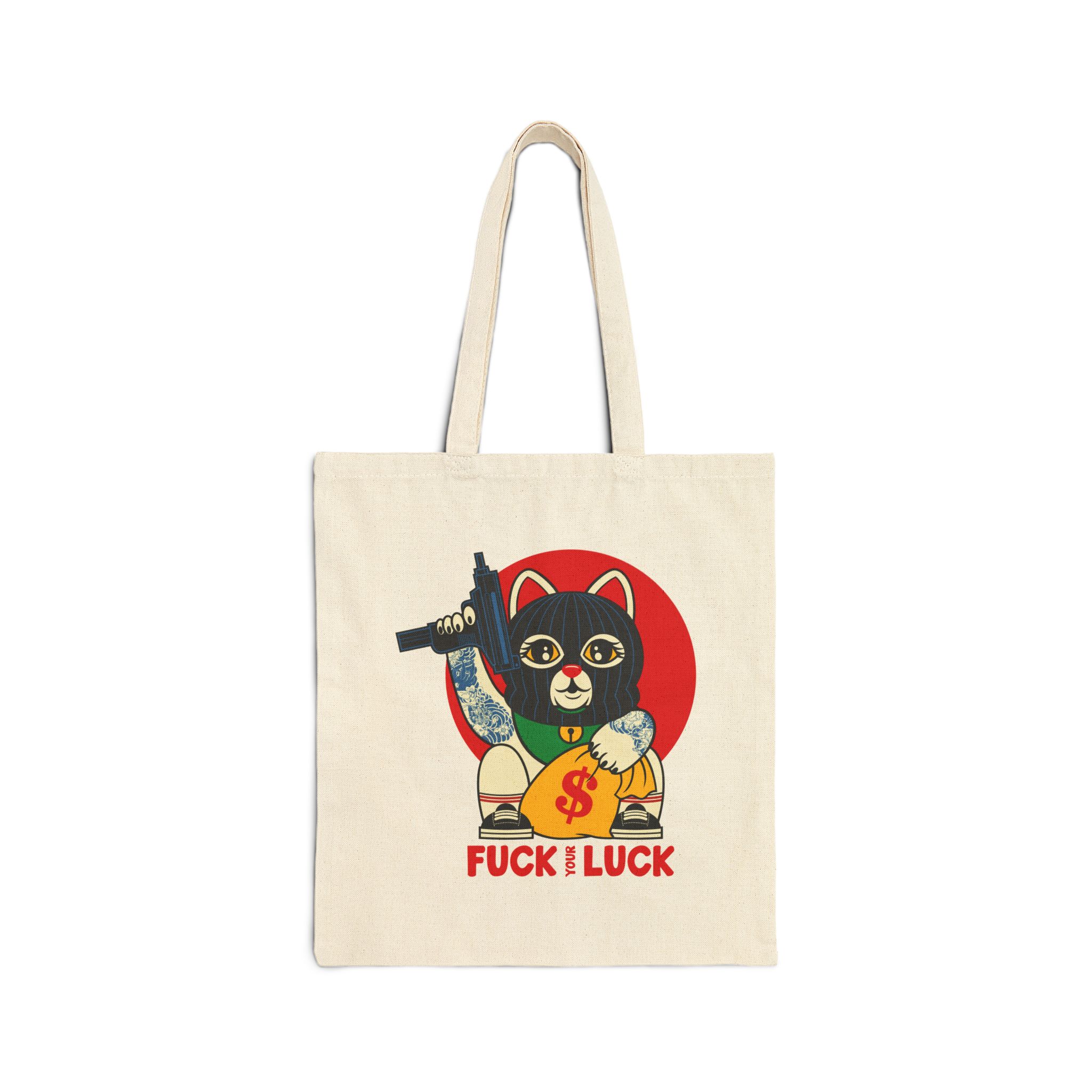 Front of the natural canvas tote showing a lucky cat in a black balaclava with blue arm tattoos, a submachine gun, a yellow money bag and a red disc
