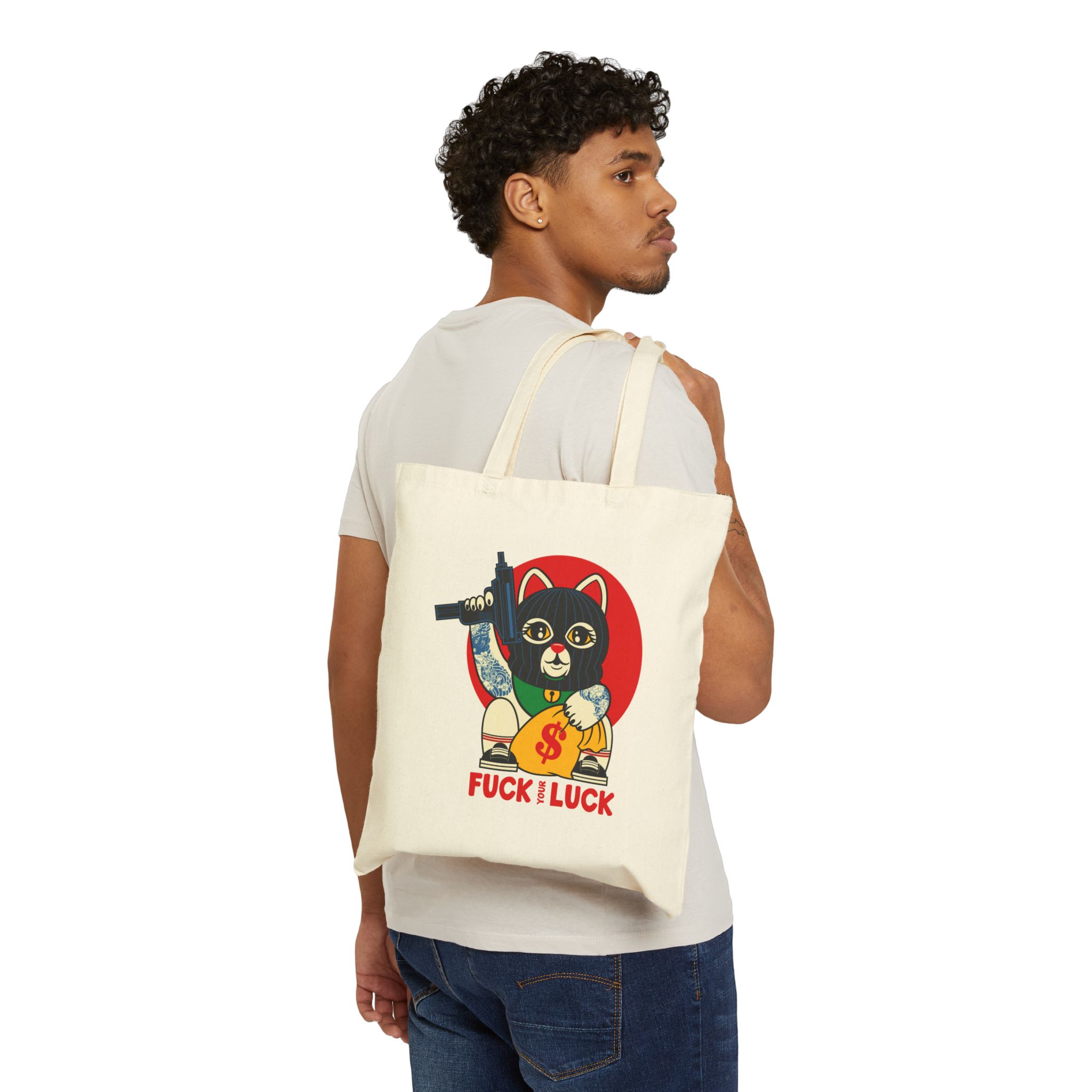 Person carrying a natural canvas tote with a lucky cat in a black balaclava with blue arm tattoos, a submachine gun, a yellow money bag and a red disc facing outward