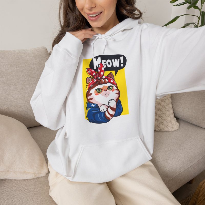 Person wearing a hoodie with a white and ginger cat flexing its paw in a blue work shirt and red polka-dot bandana on a yellow panel printed on the front