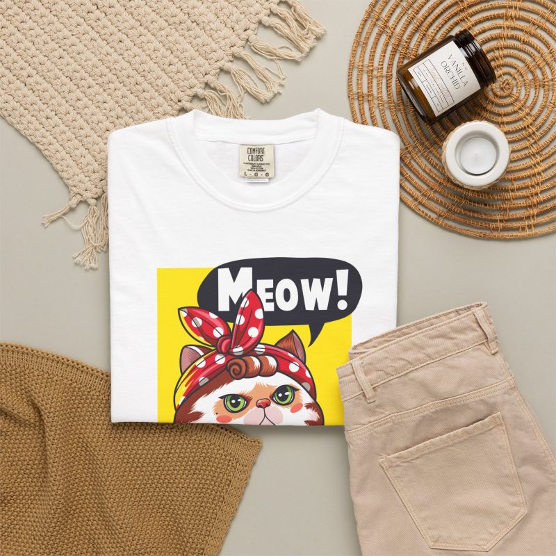 A white and ginger cat flexing its paw in a blue work shirt and red polka-dot bandana on a yellow panel in the front print