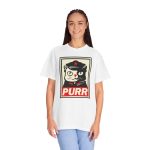 Person wearing a tee with a black and cream cat in a military cap with a red star above a red banner inside a double poster border printed on the front Person wearing a tee with a black and cream cat in a military cap with a red star above a red banner inside a double poster border printed on the front