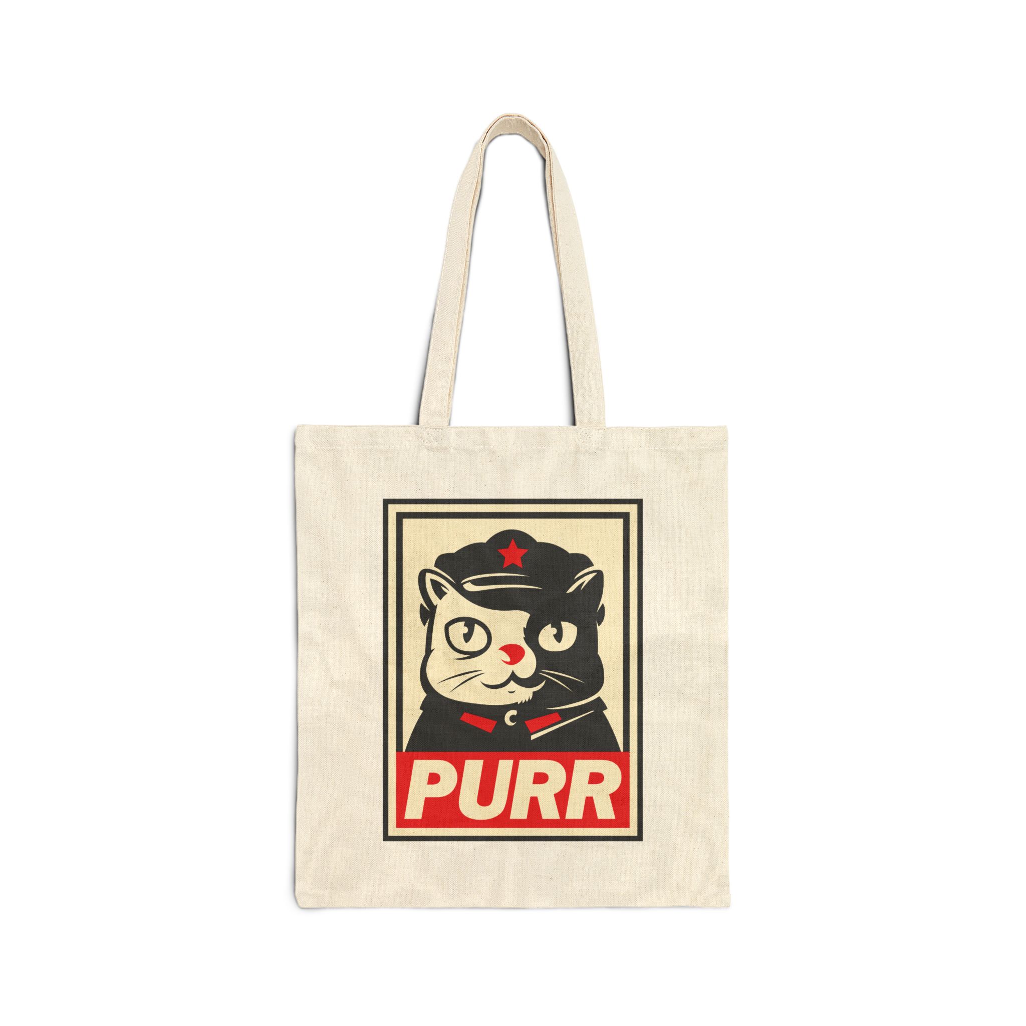 Front of the natural canvas tote showing a black and cream cat in a military cap with a red star above a red banner inside a double poster border