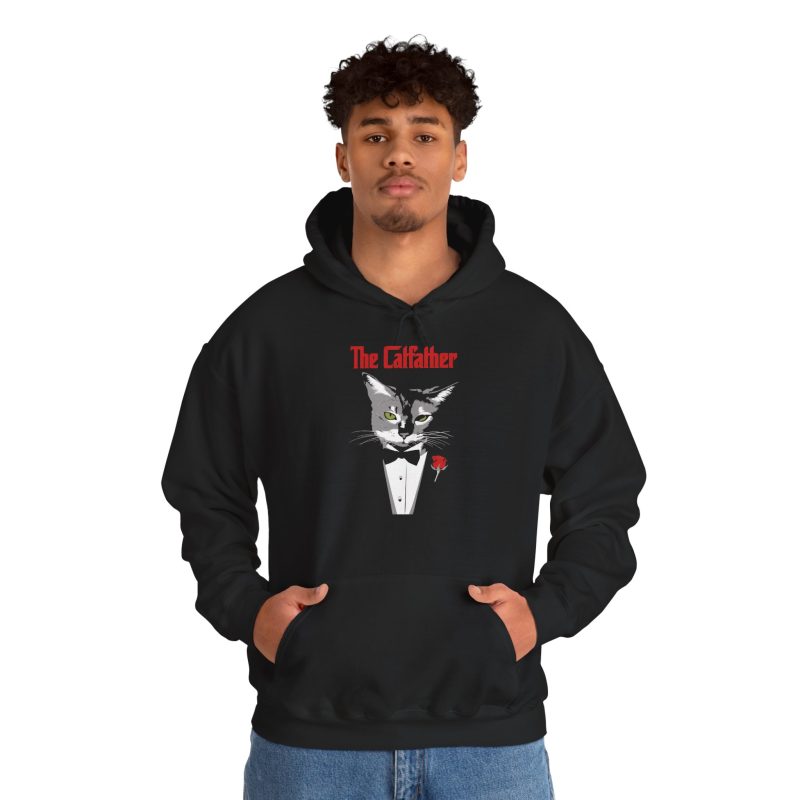 Person wearing a hoodie with a gray cat with green eyes in a white tuxedo shirt and black bow tie with a red rose printed on the front
