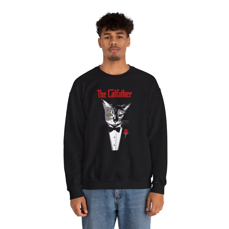 Person wearing a crewneck sweatshirt with a gray cat with green eyes in a white tuxedo shirt and black bow tie with a red rose printed on the front
