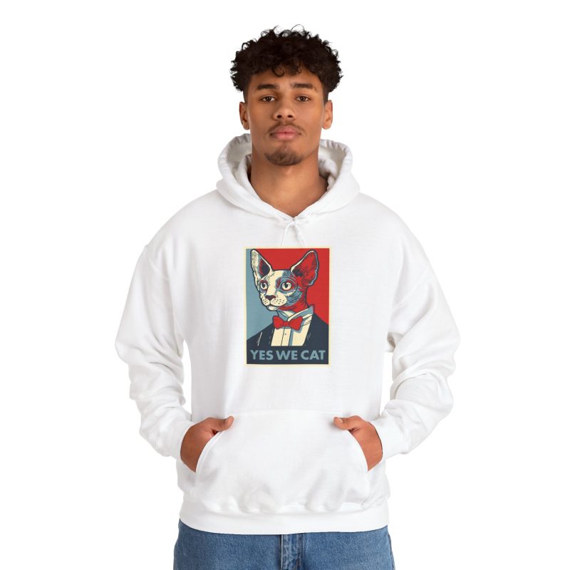 Person wearing a hoodie with a hairless cat in a suit and red bow tie printed on the front