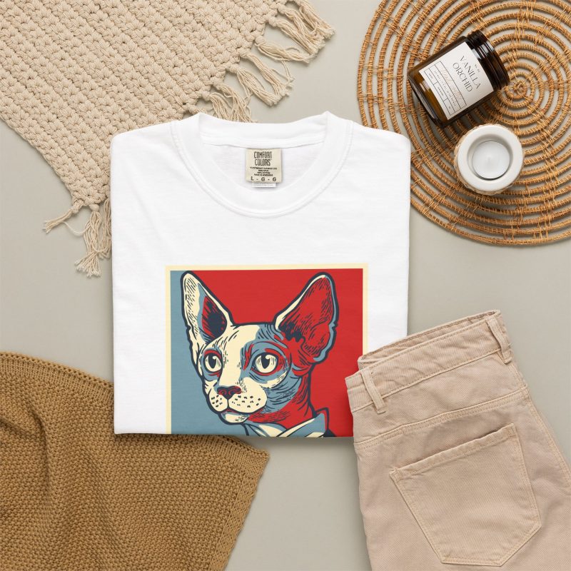 Hairless cat with large ears and a red bow tie in a red, cream and blue portrait in the front print