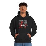 Person wearing a hoodie with a red cartoon cat and mouse trading a sneaker printed on the front Person wearing a hoodie with a red cartoon cat and mouse trading a sneaker printed on the front
