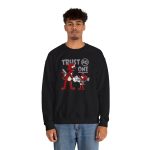 Person wearing a crewneck sweatshirt with a red cartoon cat and mouse trading a sneaker printed on the front Person wearing a crewneck sweatshirt with a red cartoon cat and mouse trading a sneaker printed on the front