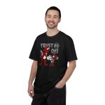 Person wearing a tee with a red cartoon cat and mouse trading a sneaker printed on the front Person wearing a tee with a red cartoon cat and mouse trading a sneaker printed on the front