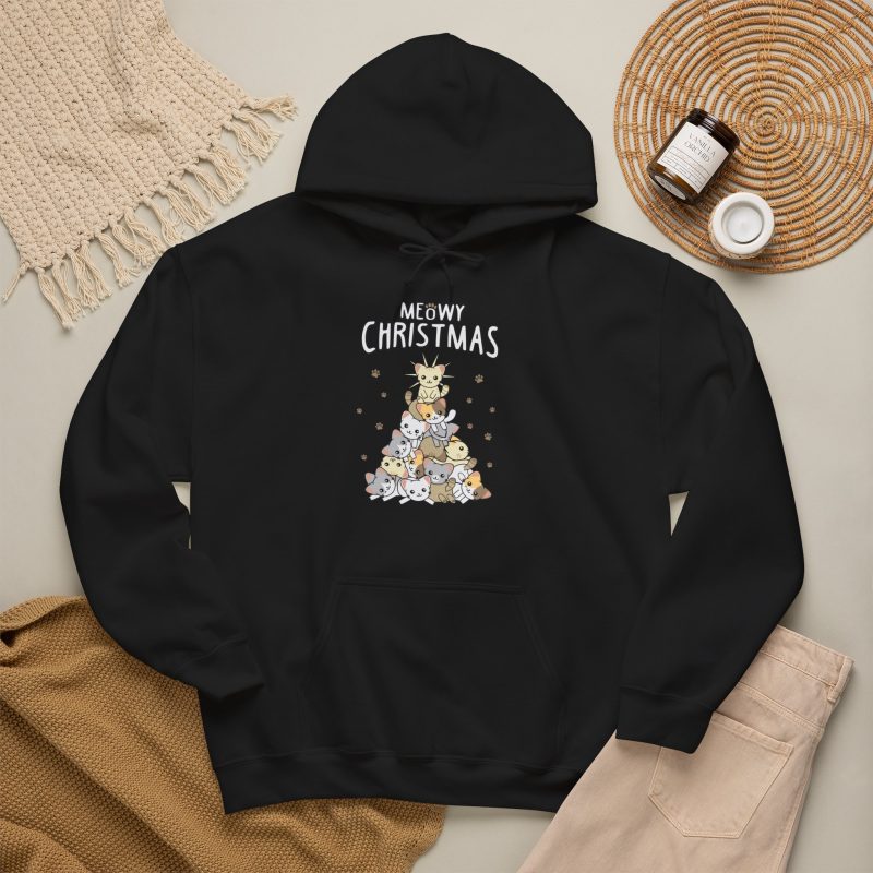 Stacked kittens, paw prints, a starburst and white MEOWY CHRISTMAS lettering in the front print
