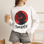 Person wearing a crewneck sweatshirt with a sly black cat silhouette inside a red circle printed on the front Person wearing a crewneck sweatshirt with a sly black cat silhouette inside a red circle printed on the front