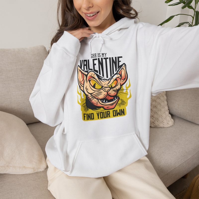 Person wearing a hoodie with a fierce hairless cat with yellow eyes and flames printed on the front