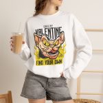 Person wearing a crewneck sweatshirt with a fierce hairless cat with yellow eyes and flames printed on the front Person wearing a crewneck sweatshirt with a fierce hairless cat with yellow eyes and flames printed on the front