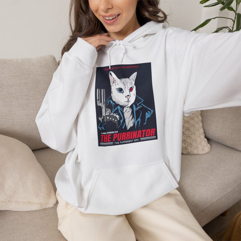 Person wearing a hoodie with a white cyborg cat with a red eye and leather jacket printed on the front