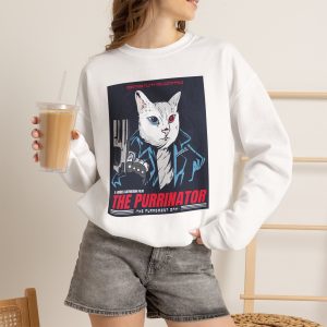 Person wearing a crewneck sweatshirt with a white cyborg cat with a red eye and leather jacket printed on the front