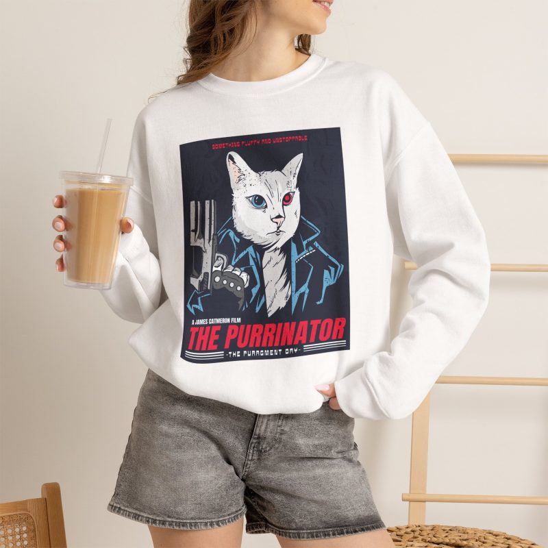 Person wearing a crewneck sweatshirt with a white cyborg cat with a red eye and leather jacket printed on the front
