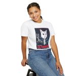 Person wearing a tee with a white cyborg cat with a red eye and leather jacket printed on the front