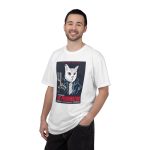 Person wearing a tee with a white cyborg cat with a red eye and leather jacket printed on the front