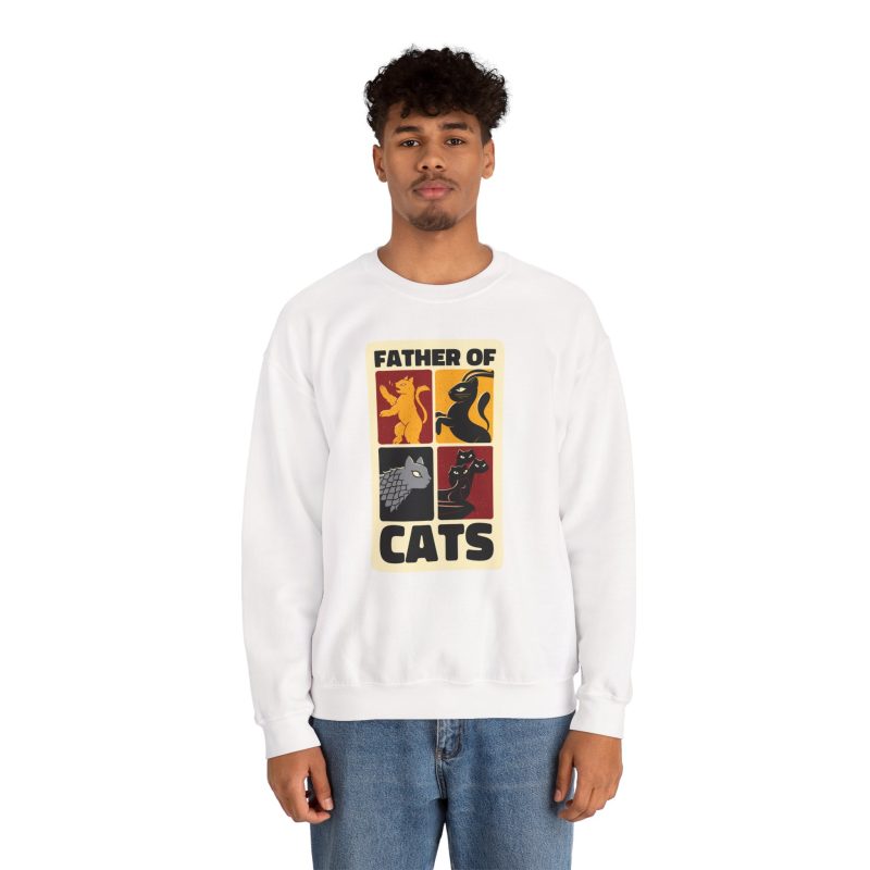 Person wearing a crewneck sweatshirt with four heraldic cat panels in red, gold, black and gray printed on the front
