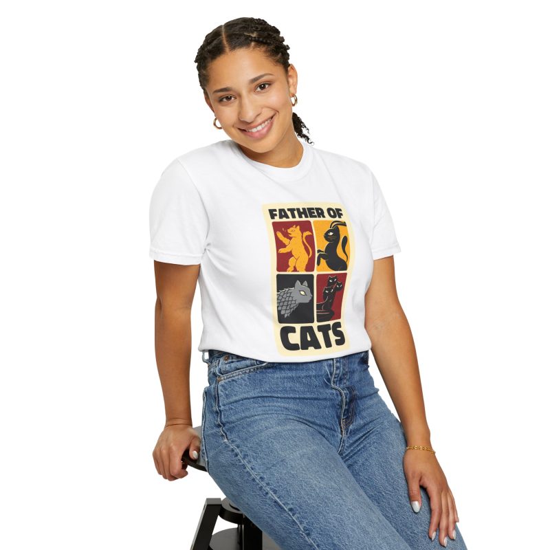 Person wearing a tee with four heraldic cat panels in red, gold, black and gray printed on the front