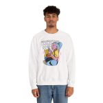 Person wearing a crewneck sweatshirt with a blue-haired girl eating ramen beside a golden ginger cat printed on the front
