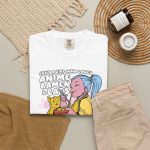 Blue-haired girl eating ramen beside a golden ginger cat and outlined lettering in the front print Blue-haired girl eating ramen beside a golden ginger cat and outlined lettering in the front print