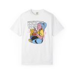 Front of the tee showing a blue-haired girl eating ramen beside a golden ginger cat Front of the tee showing a blue-haired girl eating ramen beside a golden ginger cat