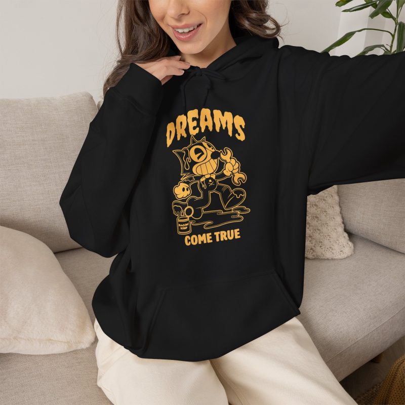 Person wearing a hoodie with a grinning rubber-hose cartoon cat holding a wrench printed on the front