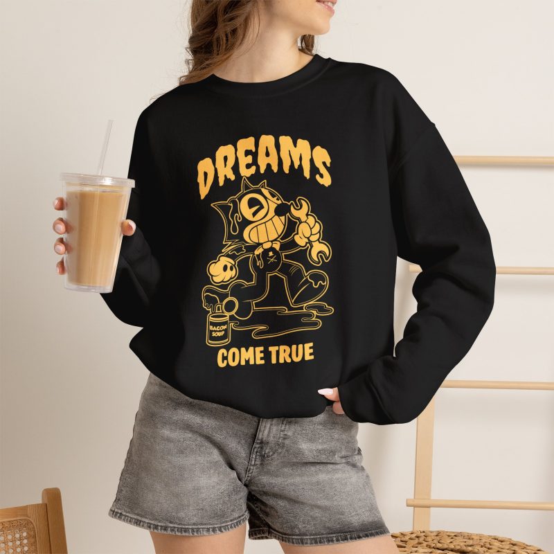 Person wearing a crewneck sweatshirt with a grinning rubber-hose cartoon cat holding a wrench printed on the front
