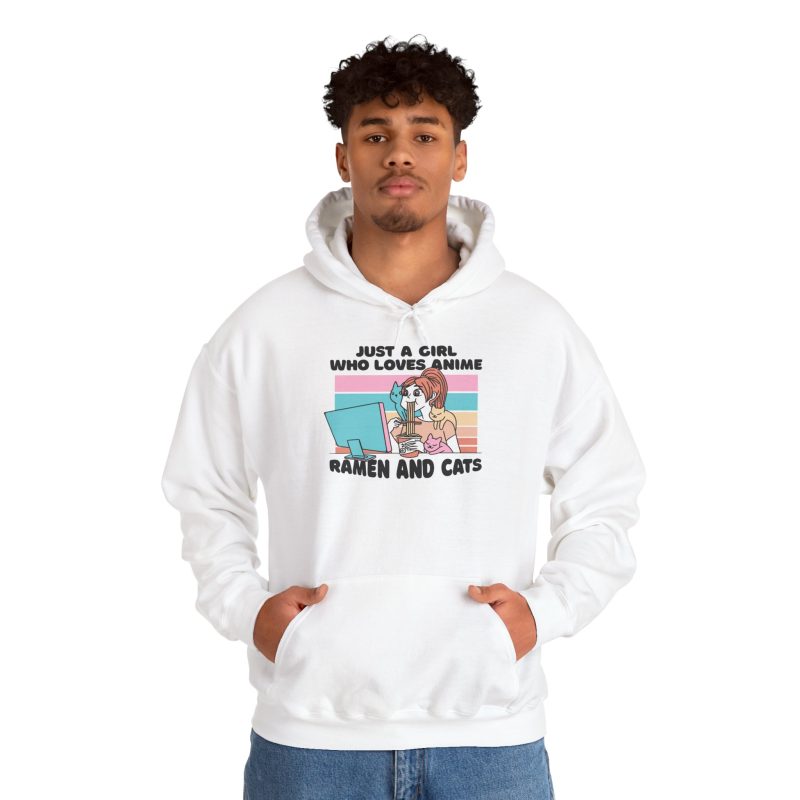 Person wearing a hoodie with a ramen-eating girl at a computer with three colorful cats printed on the front
