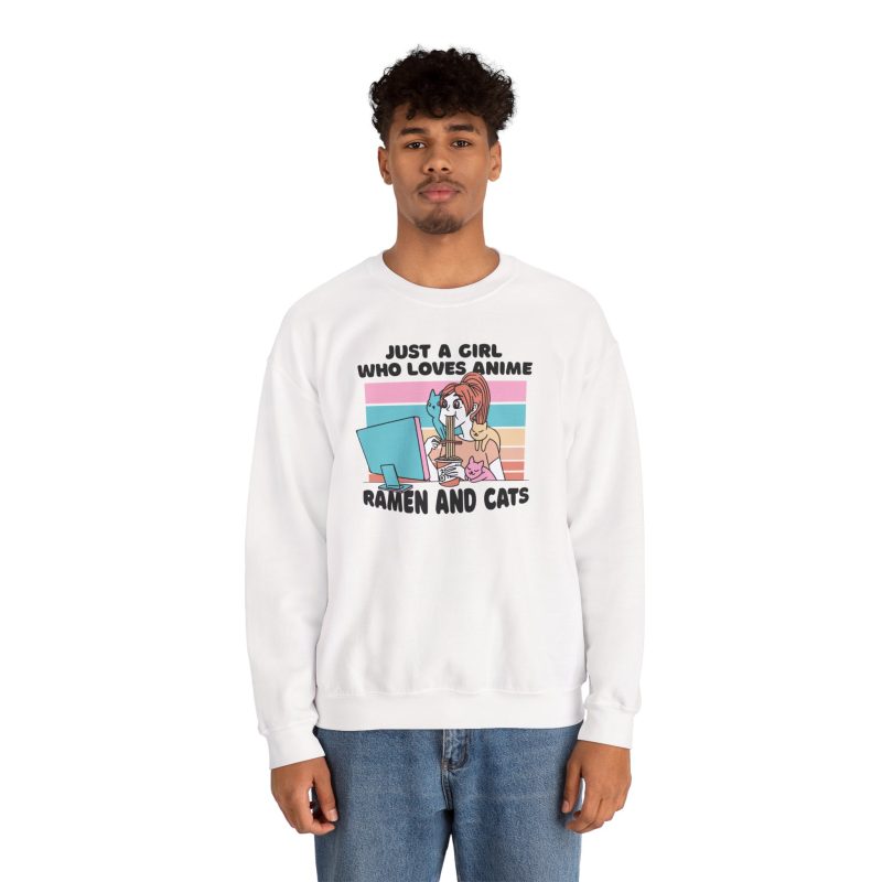 Person wearing a crewneck sweatshirt with a ramen-eating girl at a computer with three colorful cats printed on the front