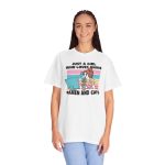 Person wearing a tee with a ramen-eating girl at a computer with three colorful cats printed on the front Person wearing a tee with a ramen-eating girl at a computer with three colorful cats printed on the front