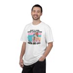 Person wearing a tee with a ramen-eating girl at a computer with three colorful cats printed on the front Person wearing a tee with a ramen-eating girl at a computer with three colorful cats printed on the front