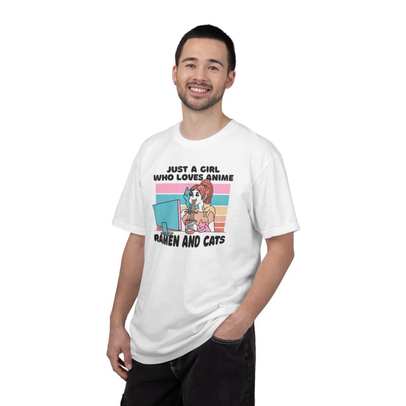 Person wearing a tee with a ramen-eating girl at a computer with three colorful cats printed on the front