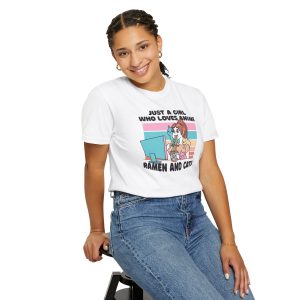 Person wearing a tee with a ramen-eating girl at a computer with three colorful cats printed on the front
