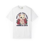 Front of the tee showing a winking pale cream cat framed by red roses and green leaves