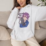 Person wearing a hoodie with a lilac-haired anime girl hugging a green-eyed gray cat printed on the front Person wearing a hoodie with a lilac-haired anime girl hugging a green-eyed gray cat printed on the front