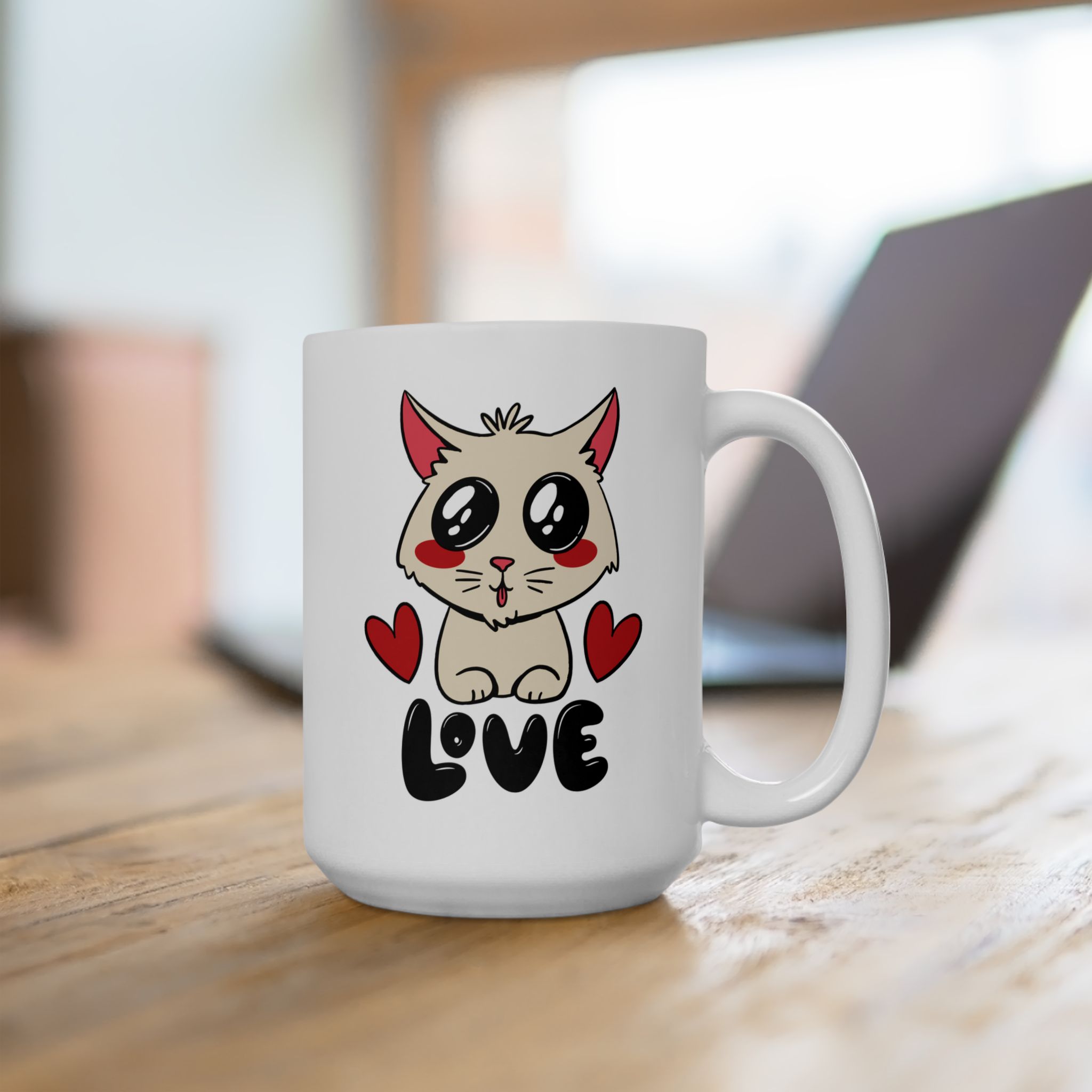 White ceramic mug showing a cream cat with glossy black eyes and red cheeks between two red hearts above black lettering