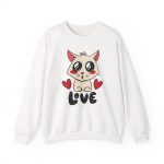 Front of the crewneck sweatshirt showing a cream cat with glossy black eyes and red cheeks between two red hearts above black lettering Front of the crewneck sweatshirt showing a cream cat with glossy black eyes and red cheeks between two red hearts above black lettering