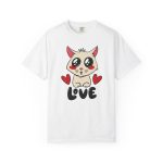 Front of the tee showing a cream cat with glossy black eyes and red cheeks between two red hearts above black lettering Front of the tee showing a cream cat with glossy black eyes and red cheeks between two red hearts above black lettering