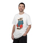 Person wearing a tee with a blue boxer cat with red gloves and a determined expression printed on the front Person wearing a tee with a blue boxer cat with red gloves and a determined expression printed on the front