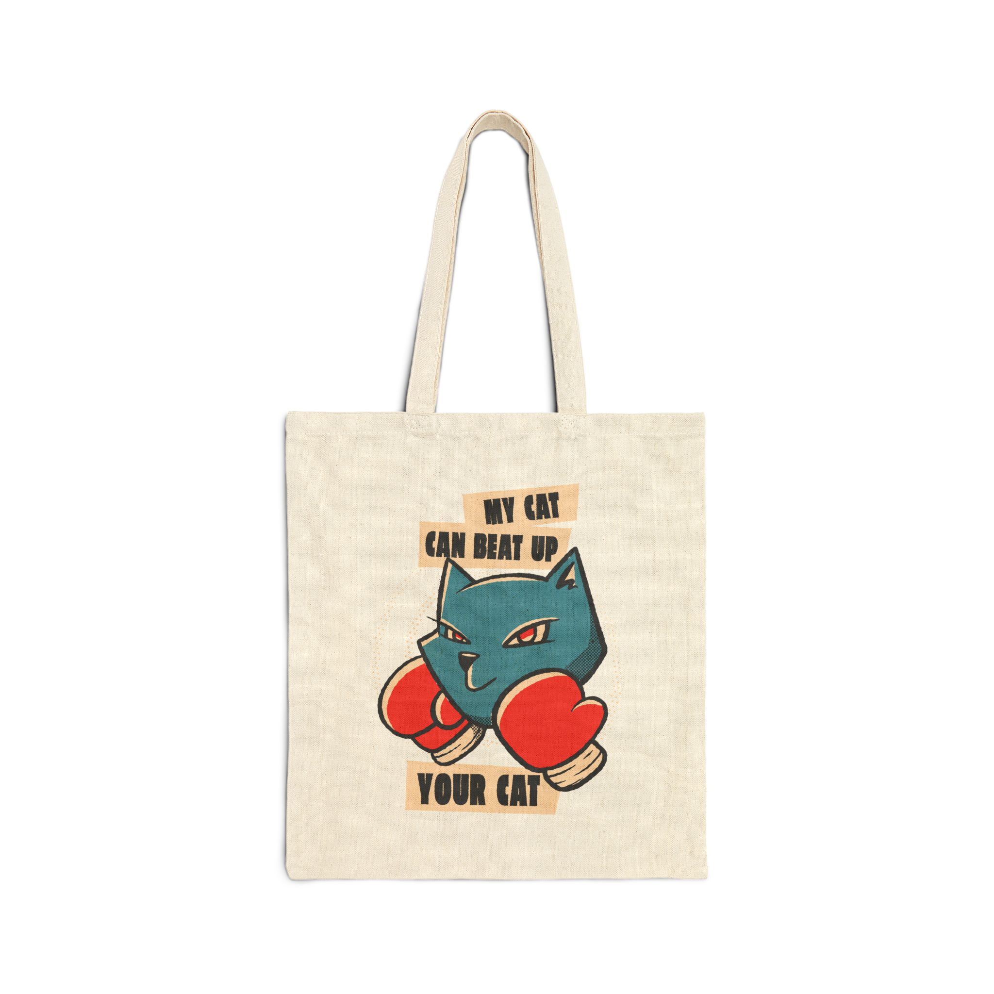 Front of the natural canvas tote showing a blue boxer cat with red gloves and a determined expression