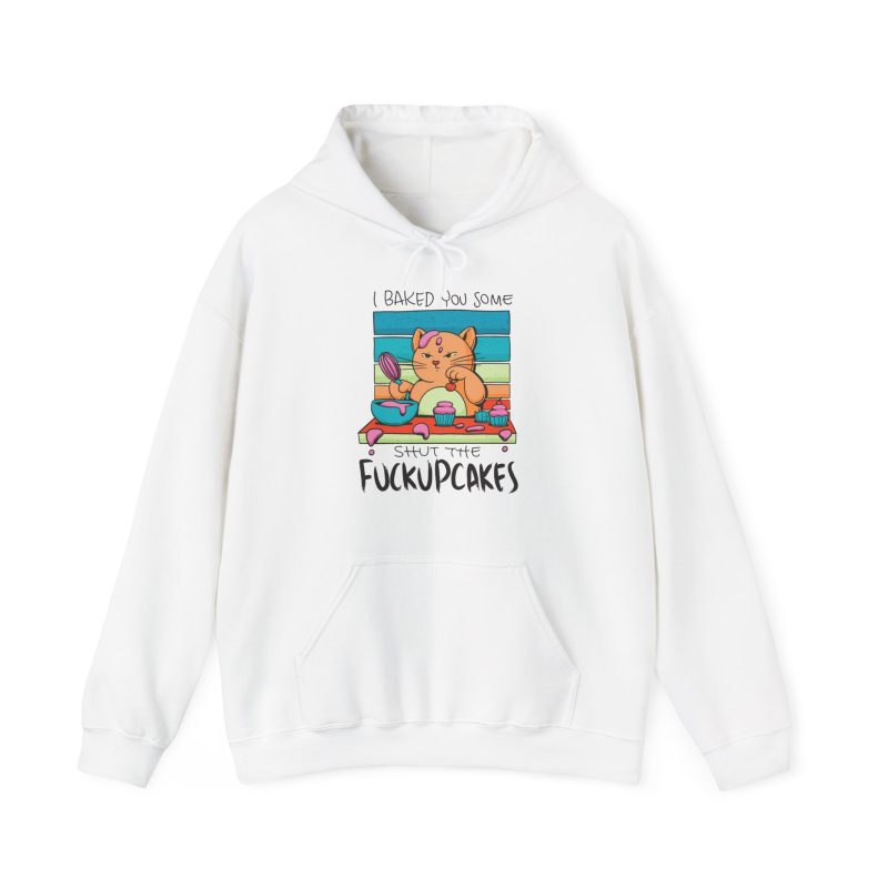 Front of the hoodie showing a ginger baker cat with a pink whisk, cupcakes and turquoise retro stripes