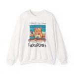 Front of the crewneck sweatshirt showing a ginger baker cat with a pink whisk, cupcakes and turquoise retro stripes Front of the crewneck sweatshirt showing a ginger baker cat with a pink whisk, cupcakes and turquoise retro stripes